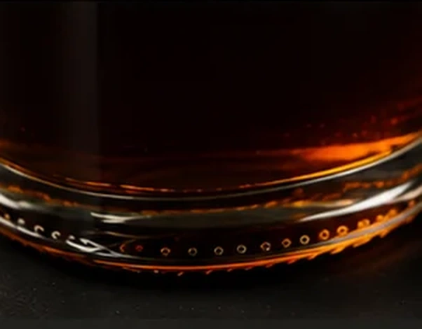Close-up packaging concept of the dark amber glass base