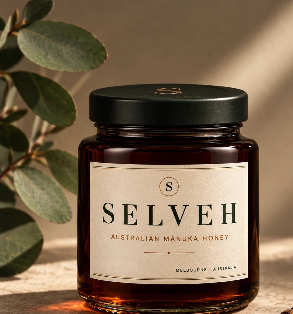 SELVEH Australian Mānuka line packaging concept in dark amber glass with an ivory label and forest-black lid